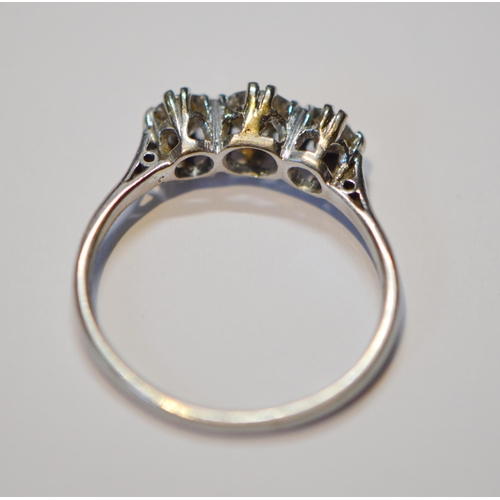 232 - Diamond three-stone ring set with brilliants, approximately .40ct and .25ct, approximately .9ct in t... 