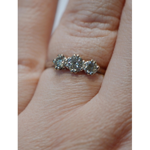 232 - Diamond three-stone ring set with brilliants, approximately .40ct and .25ct, approximately .9ct in t... 