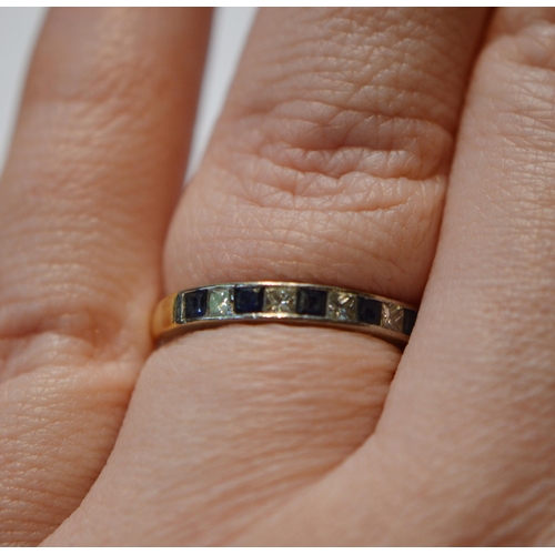 235 - Diamond and sapphire half eternity ring in 18ct gold, 2000, size N, 2.9g gross.