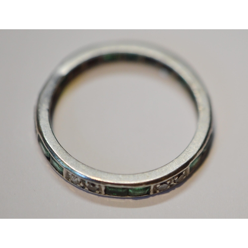 236 - Diamond full eternity ring set with diamonds and emeralds in pairs, white gold, size M, 2.9g gross.