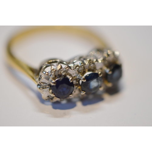 238 - Sapphire and diamond three-stone ring set with three sapphires and flanked with eight-cut small bril... 