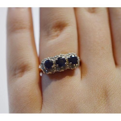 238 - Sapphire and diamond three-stone ring set with three sapphires and flanked with eight-cut small bril... 