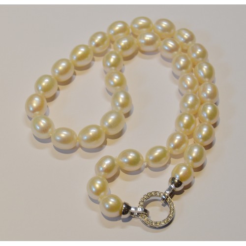 189 - Freshwater pearl necklace with 925 silver and diamond-set concentric clasp, approximately thirty-six... 