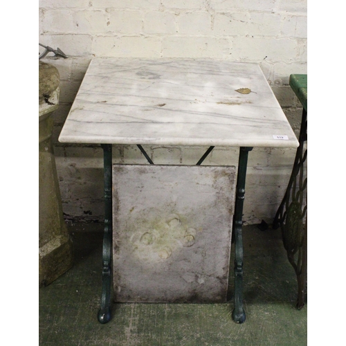 519 - Wrought iron green painted base with marble top.