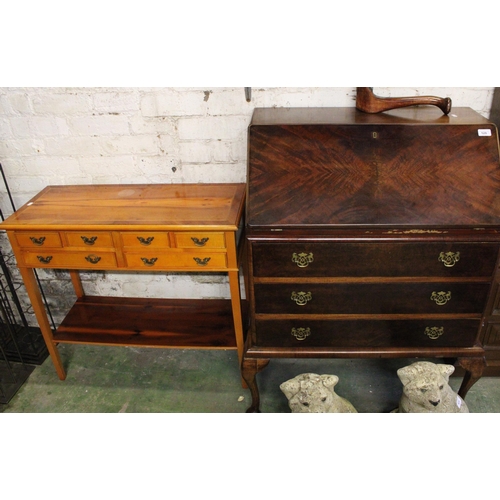 528 - Mahogany three drawer bureau 104cm x 76cm and a reproduction Yew wood side table, 81cm wide.