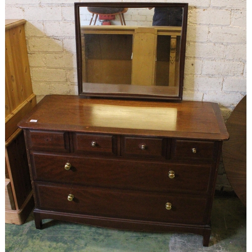 552 - Stag dressing table fitted four small over two long drawers.