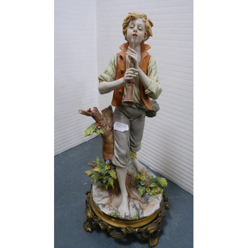 100 - Four Italian Capodimonte-style figures modelled as girls reading, a girl with chick, boy playing an ... 