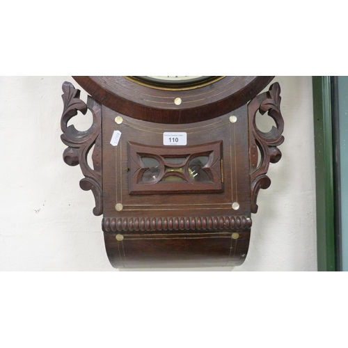 110 - Victorian mahogany drop dial wall clock decorated with mother of pearl, twin train dial.