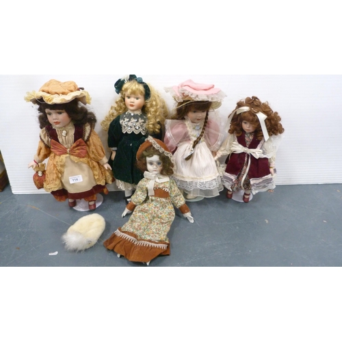 114 - Five porcelain-headed dolls, all with clothing.  (5)