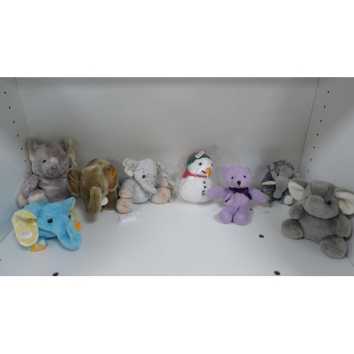 117 - Small Steiff elephant and other stuffed animals.  (8)