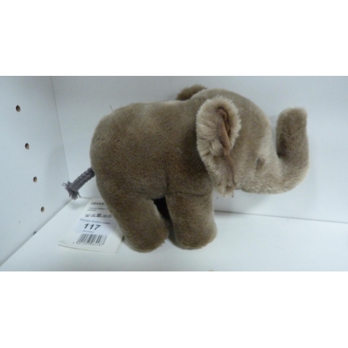 117 - Small Steiff elephant and other stuffed animals.  (8)