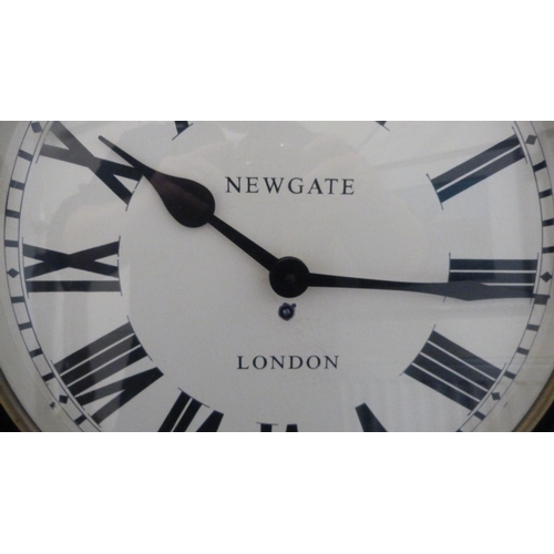 33 - Modern wall clock by Newgate of London.