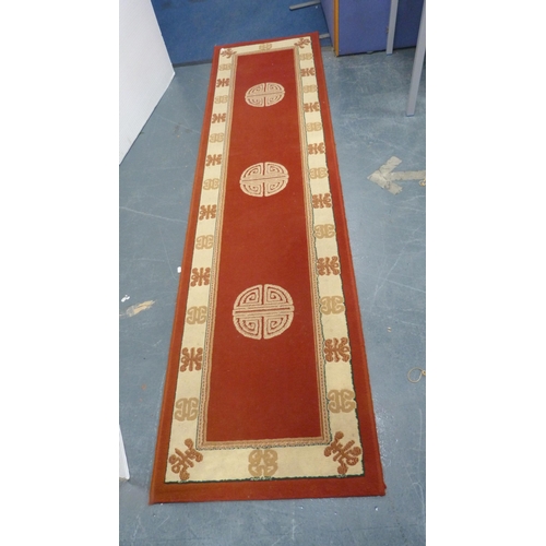 37 - Group of small modern machine-made rugs to include two Chinese-style examples and another.  (3)