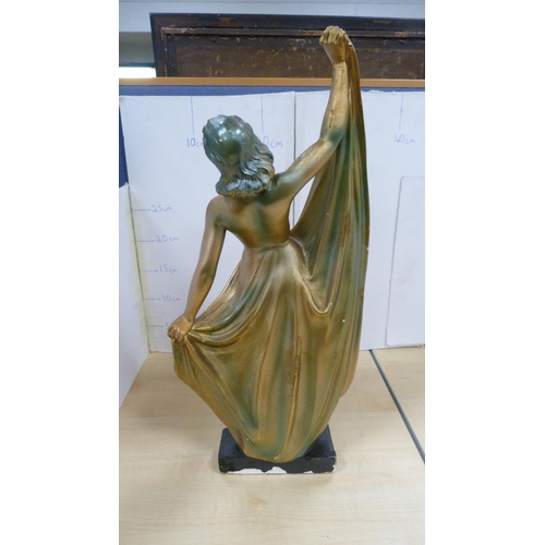 40 - Three Art Deco-style painted plaster figures.  (3)