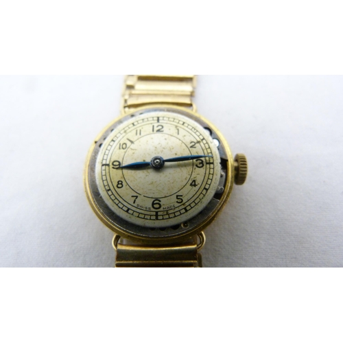 402 - 9ct gold-backed lady's wristwatch.