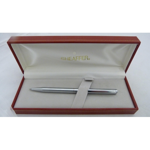 405 - Boxed Sheaffer pen and a boxed Papermate pen.  (2)