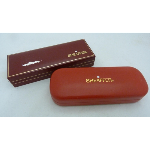 406 - Two boxed Scheaffer fountain pens, one with refills.