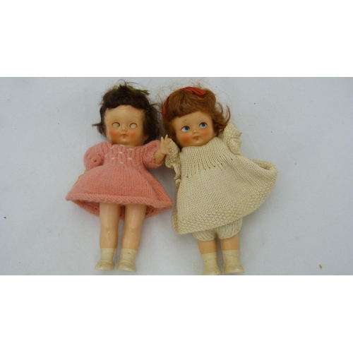 408 - Box of jewellery and collectables to include Pedigree dolls and a pair of child's shoes.