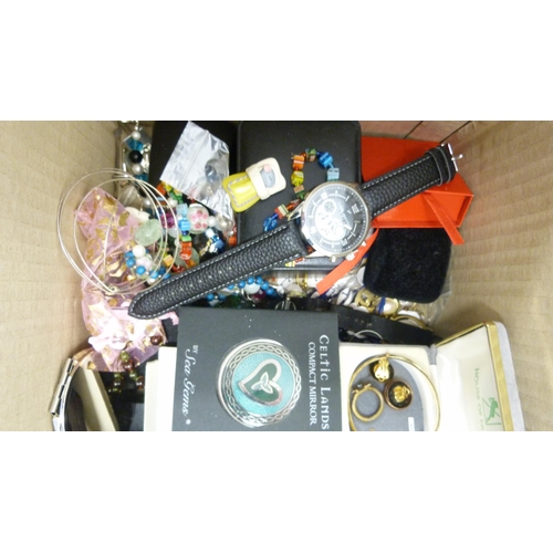 409 - Box of costume jewellery to include a Victorian-style brooch, fashion watches, bangles, necklaces et... 