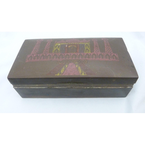 410 - Box of curios to include an Indian brass box, bangle, spectacles etc.