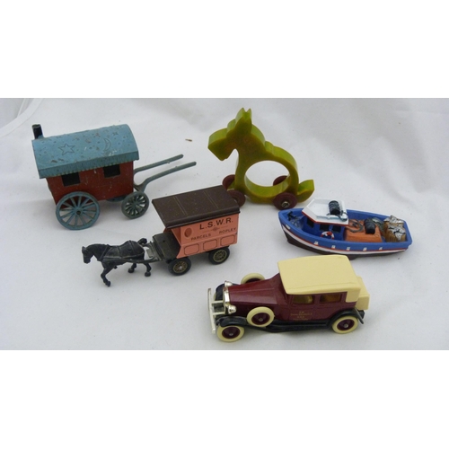 410 - Box of curios to include an Indian brass box, bangle, spectacles etc.