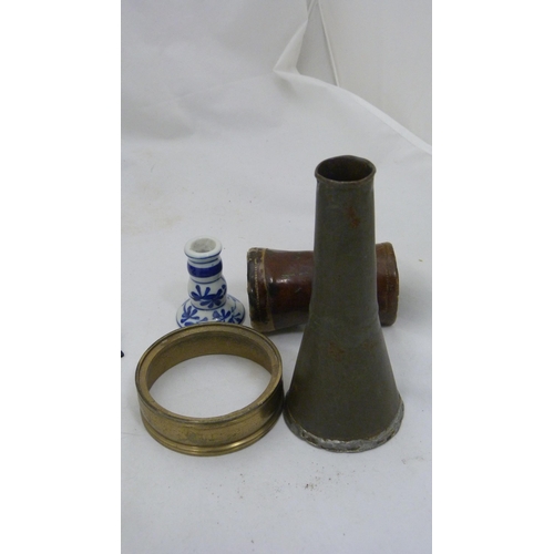 410 - Box of curios to include an Indian brass box, bangle, spectacles etc.