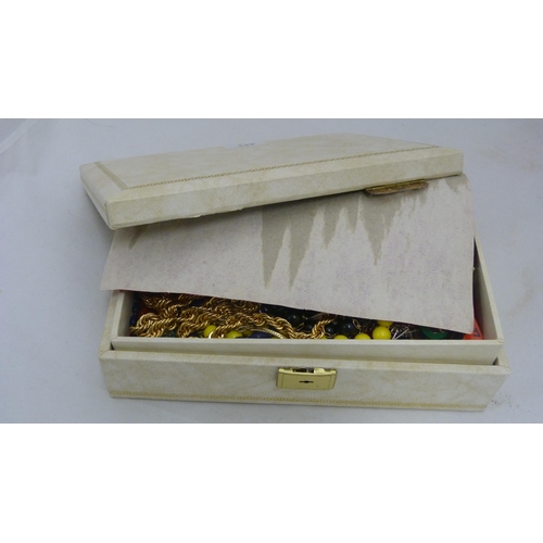 411 - Jewellery box containing silver and costume jewellery to include silver rings, bead necklaces, bangl... 