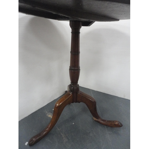 420 - George III mahogany snap-action tripod table with saucer top, approximately 70cm high.