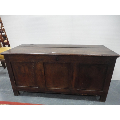 421 - 19th century oak coffer with hinged top enclosing a pine candle box, three-panel front, iron lock, o... 