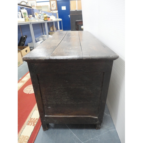 421 - 19th century oak coffer with hinged top enclosing a pine candle box, three-panel front, iron lock, o... 