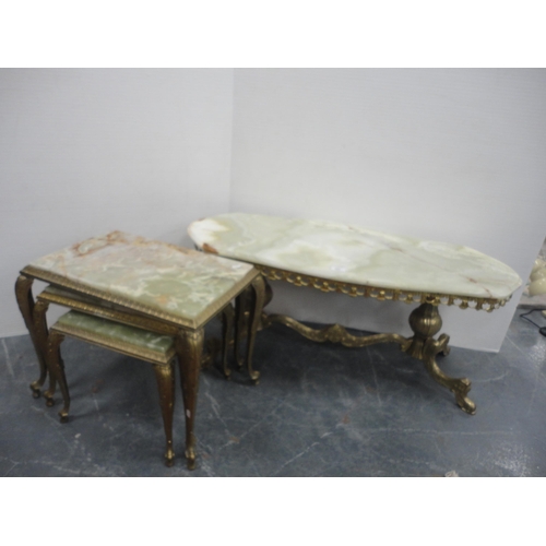 423 - Onyx coffee table and a nest of three onyx tables.