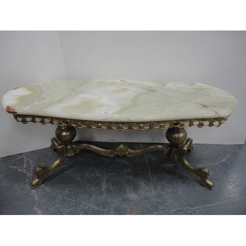 423 - Onyx coffee table and a nest of three onyx tables.