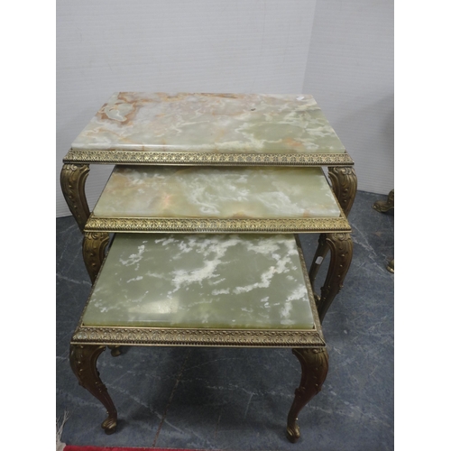 423 - Onyx coffee table and a nest of three onyx tables.