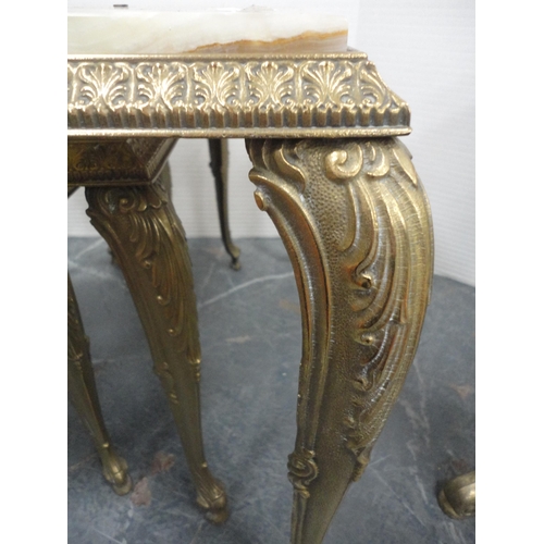 423 - Onyx coffee table and a nest of three onyx tables.