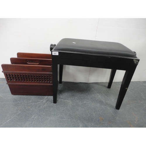 424 - Adjustable ebonised piano stool and a magazine rack.  (2)