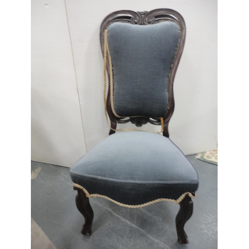 427 - Victorian mahogany nursing-type chair, upholstered in later pink floral moquette, on ceramic castors... 