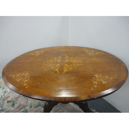 428 - Victorian inlaid walnut loo-type table with oval top, on turned column and tripod scroll supports an... 