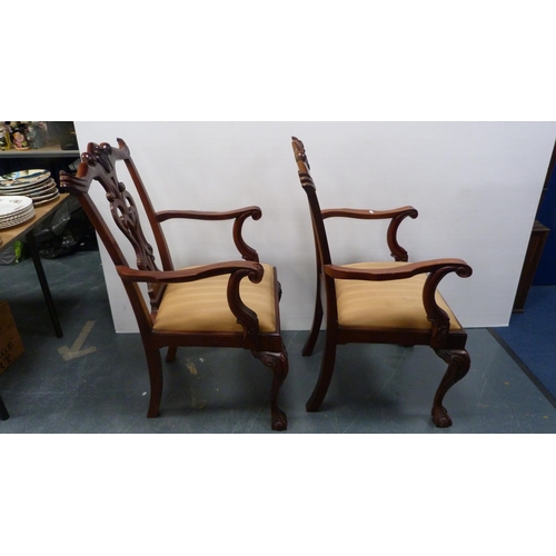 429 - Pair of Chippendale-style mahogany elbow chairs with acanthus decoration and slip-in seats, on ball ... 