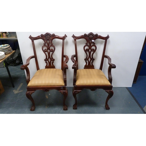 429A - Pair of Chippendale-style mahogany elbow chairs with acanthus decoration and slip-in seats, on ball ... 