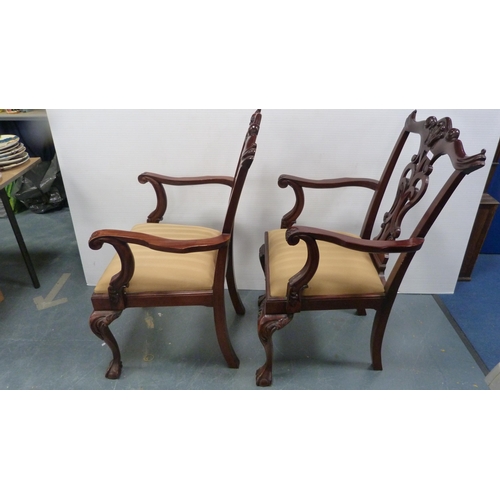 429A - Pair of Chippendale-style mahogany elbow chairs with acanthus decoration and slip-in seats, on ball ... 