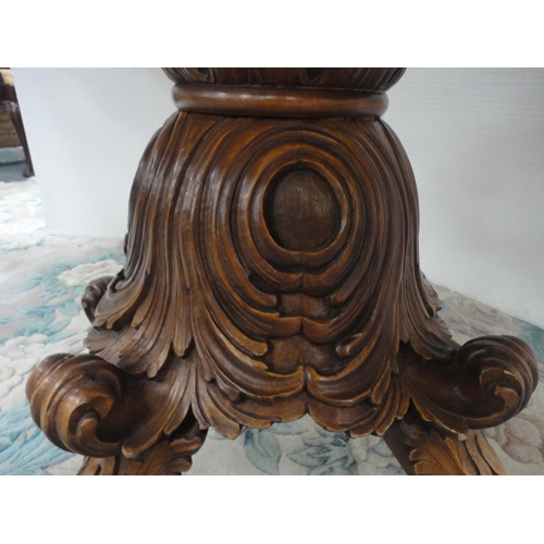 430 - Italian Sorrento-style walnut dining table with scroll inlay to the shaped top, on turned and carved... 