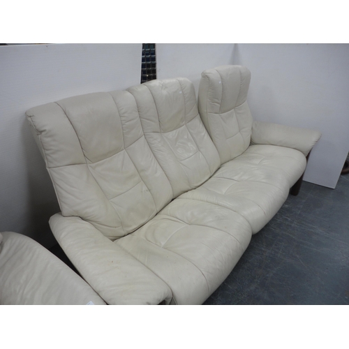 439 - Ekornes stressless three-piece suite to include a three-seater reclining settee, recliner armchair a... 