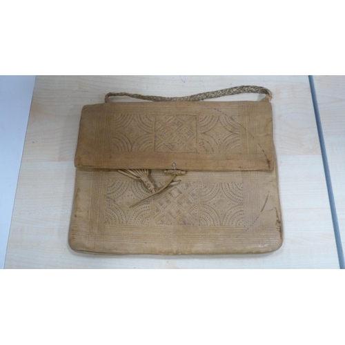 44 - Animal skin handbag, another, similar, decorated with a camel, prayer books etc.