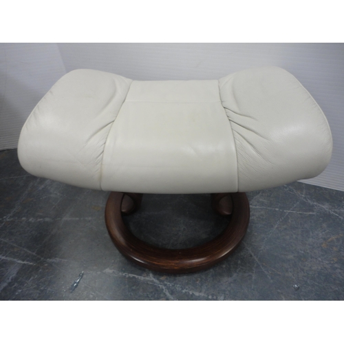 440 - Contemporary stressless style recliner armchair and footstool.  (2)