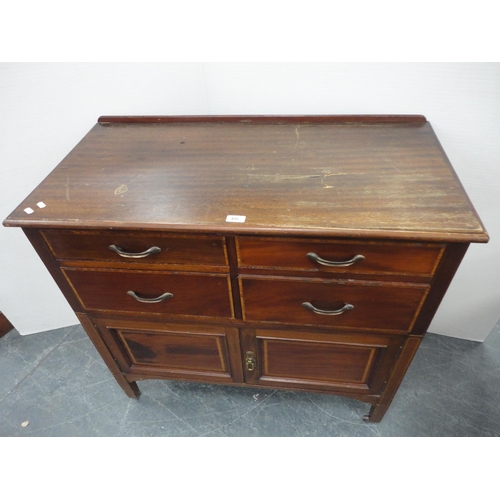 446 - Cupboard chest of four drawers with two doors below, label to interior.