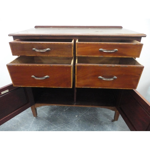 446 - Cupboard chest of four drawers with two doors below, label to interior.