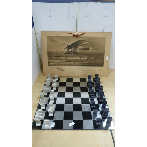 45 - Contemporary chess board with aluminium pieces and an unframed print of the first Blackburn monoplan... 