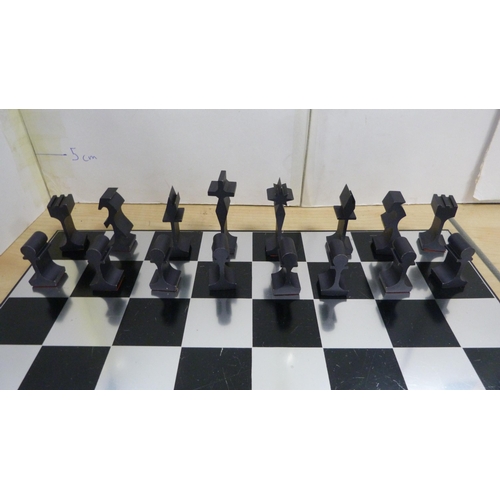 45 - Contemporary chess board with aluminium pieces and an unframed print of the first Blackburn monoplan... 