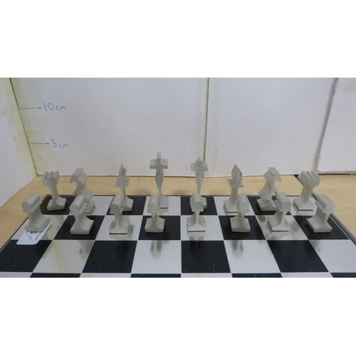 45 - Contemporary chess board with aluminium pieces and an unframed print of the first Blackburn monoplan... 