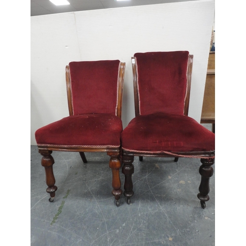 450 - Set of four Victorian mahogany dining chairs of graduated sizes, upholstered in later red velour, on... 